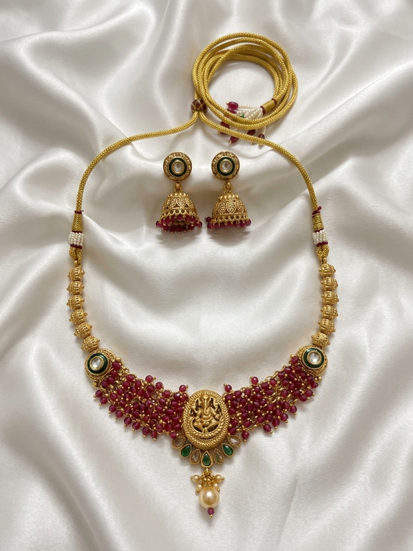 Meraki Gold Plated Ganesh Design with White Pearls Necklace – Earring Set