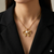 Gold Plated Bow Pendant with Pearl