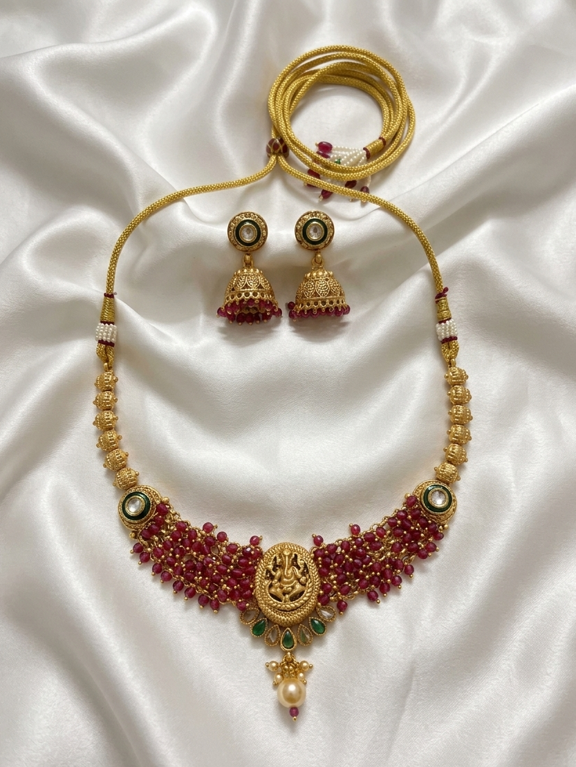 Meraki Gold Plated Ganesh Design with White Pearls Necklace – Earring Set