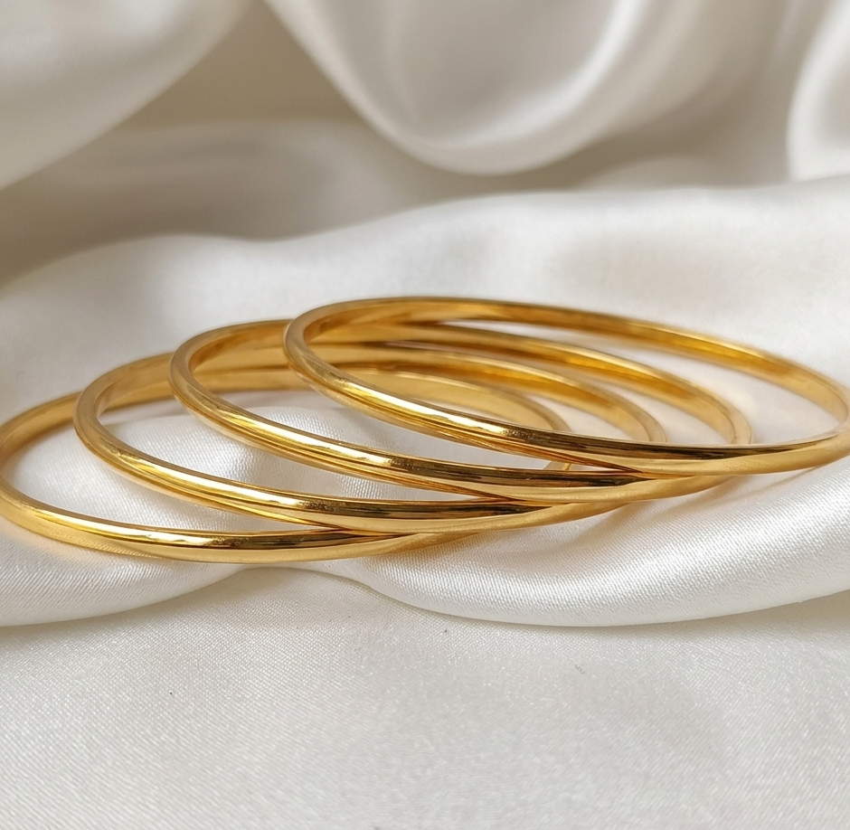 Buy Meraki Gold Thin Bangles