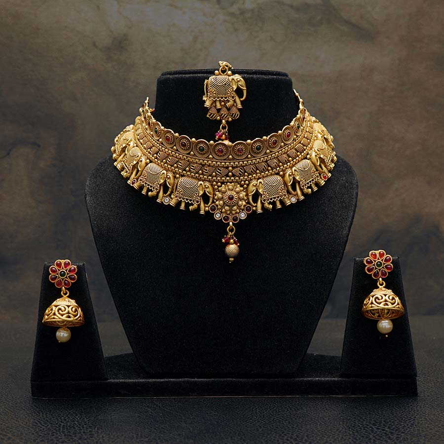 Meraki Gold plated Antique Elephant Design with Red and Green Stone Stone