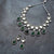 Kundan Polki Plated Emerald Green Zirconia Droplet Necklace Set