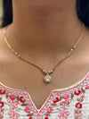Diamond Studded Mangalsutra Gold Chain And Black Pearl