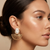 Gold Tone Sun Shaped Shell Earring