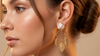 Designer Gold Finish Leaf Pearl Earrings