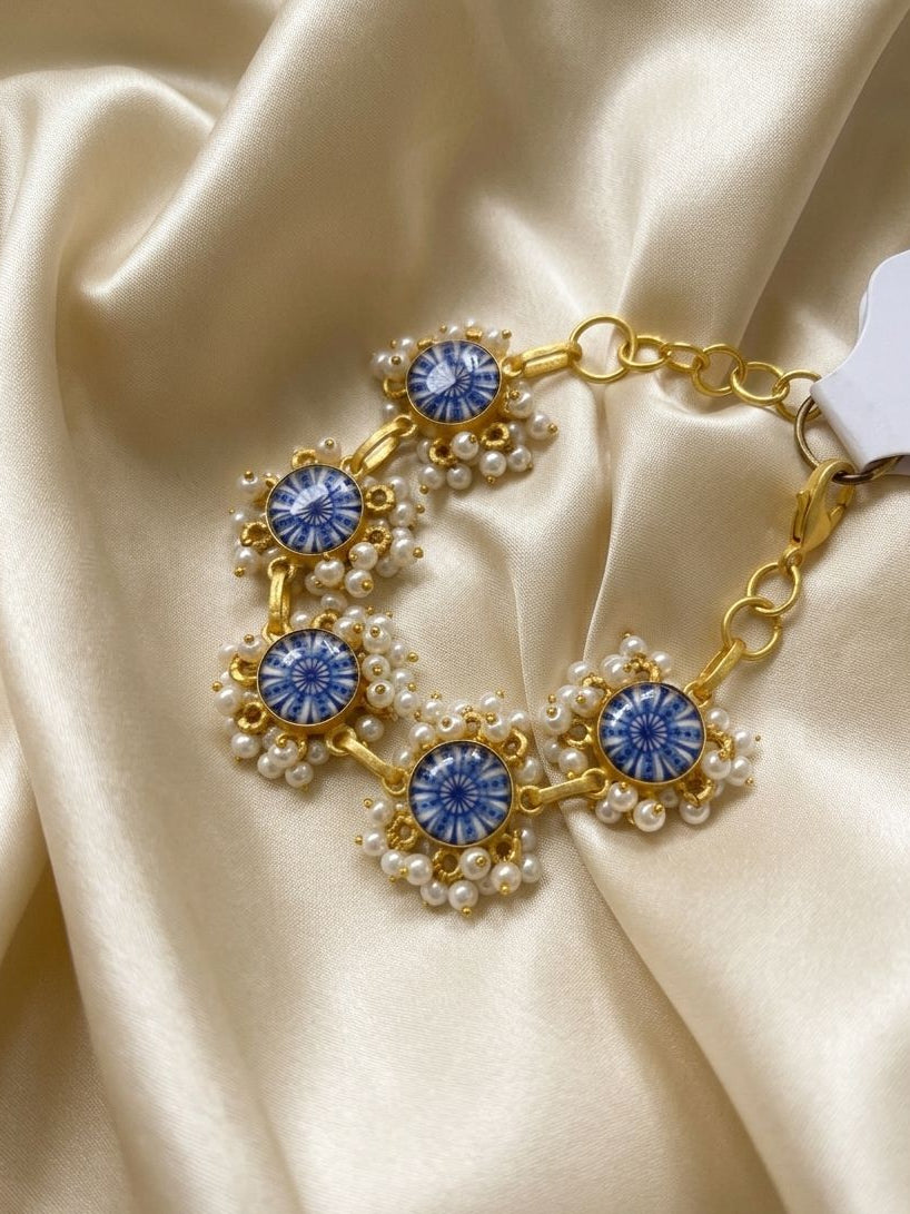 Gold Plated Blue Printed Stone with Small White Pearl Adjustable Bracelet